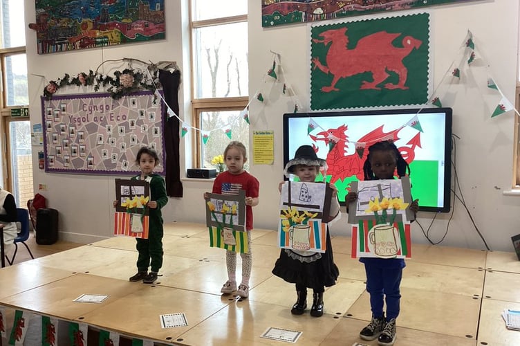 Wonderful artists in nursery with their winning artwork