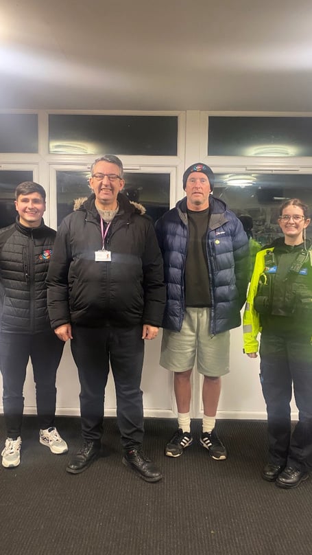 PCC Andy Dunbobbin with a member of staff from North Wales Police and staff from the youth club