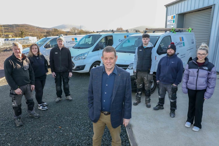 Elfyn Owen foreground Gwynfor Evans, Catrin Williams, Wyn Parry, Owain Feaver, Iwan Lloyd, and Zara Tudor-Jones