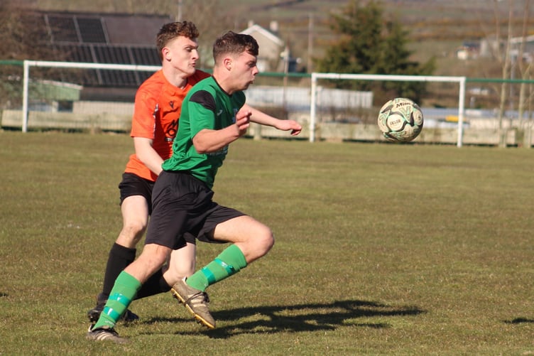 Midfield action from Penrhyndeudraeth's 4-1 win at Llanerch-y-Medd