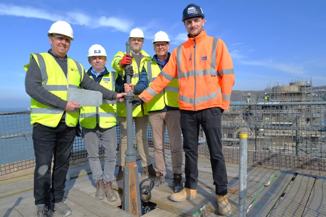 Old College turrets restored as project marks milestone