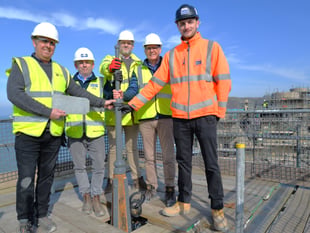 Old College turrets restored as project marks milestone