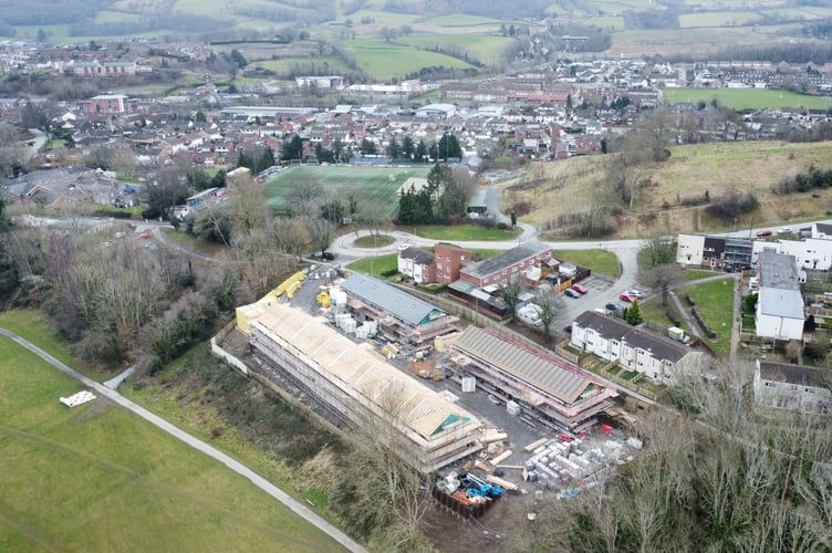A new council housing development that is being built at the former Robert Owen House in Newtown