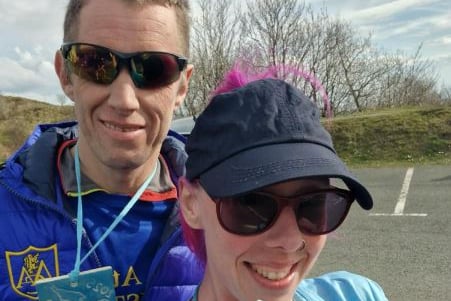 Husband and wife team Stephen and Jennie Thomas of Aber AC celebrating completing the Silver Trail half marathon