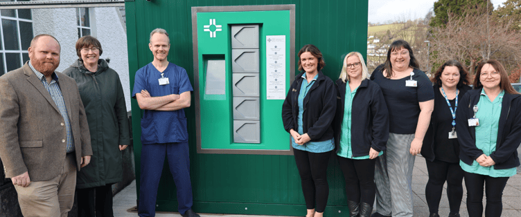 Staff at the medication machine at Dolgellau Hospital. Photo: BCUHB