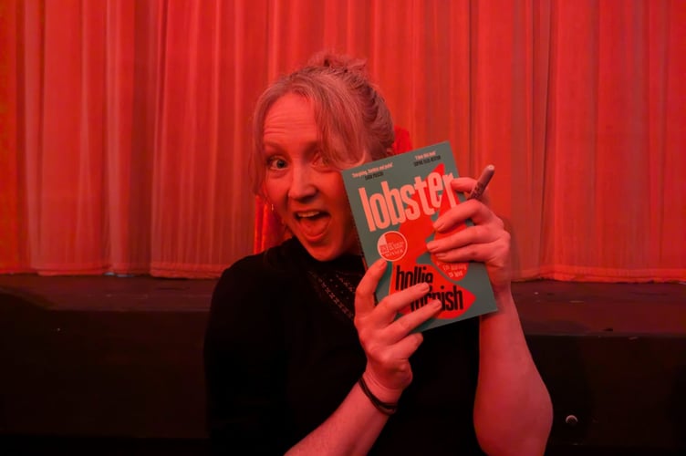 Hollie McNish signing books after reading from her new collection, Lobster, at Magic Lantern Theatre in Tywyn
