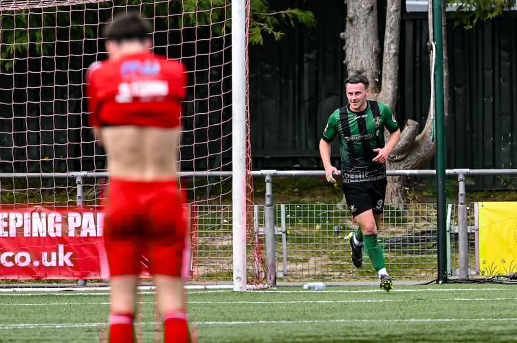 NEWTOWN, WALES - 12 APRIL 2025: Niall Flint of Aberystwyth Town celebrates his goal to make it 1-1 during the 2024/25 JD Cymru Premier fixture between Newtown AFC & Aberystwyth Town at Latham Park, Newtown, Wales (Pic by Craig Thomas/FAW)