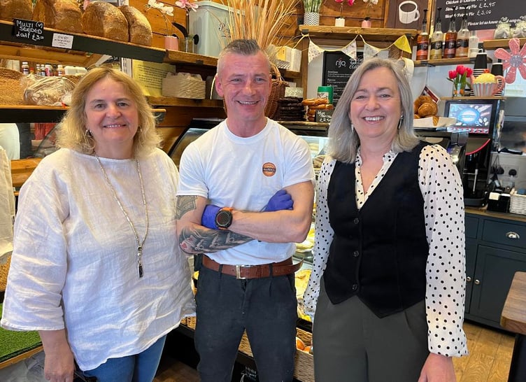 Delyth Lloyd Griffiths, (caseworker for Liz Saville Roberts), Liz Saville Roberts MP, and Daniel Kuczynski from DDs Bakery and Sandwich Bar