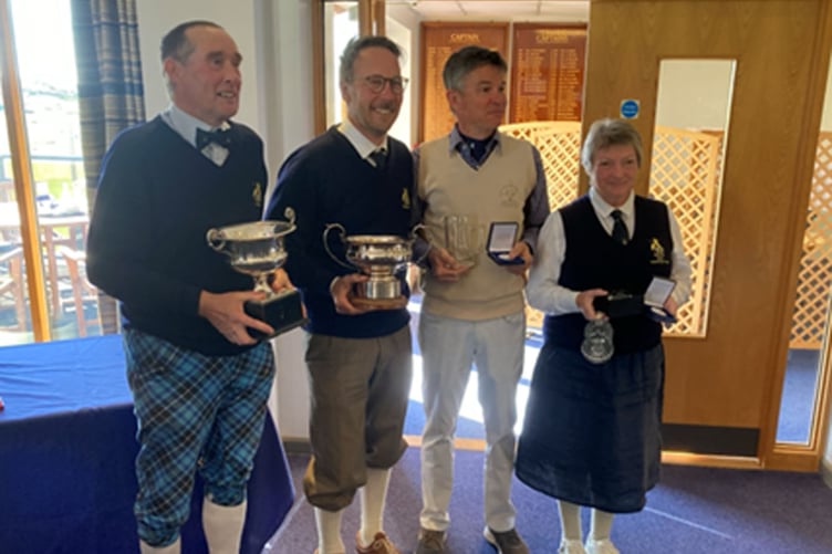 Aberdovey Golf Club won the annual match against the British Golf Collectors’ Society (BGCS) for the Darwin Trophy with an aggregate of nine holes up to the collectors' seven holes. Following the after-match dinner, Nigel Notley (BGCS Captain) presented the Darwin Trophy to Aberdovey Captains, Dawn Cannon and Dave Williams.