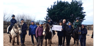 Golf captains give £4,100 to Meirionnydd Special Riding Group