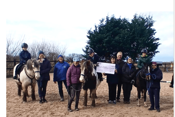 A donation of £4,100 has been presented to the Meirionnydd Special Riding Group, thanks to the fundraising efforts of last year’s Aberdovey Golf Club Captains, who chose to support the local charity during their year in office. Pictured handing over the cheque at the stables are 2024 Captains, Hil Brunner and Janet Price.