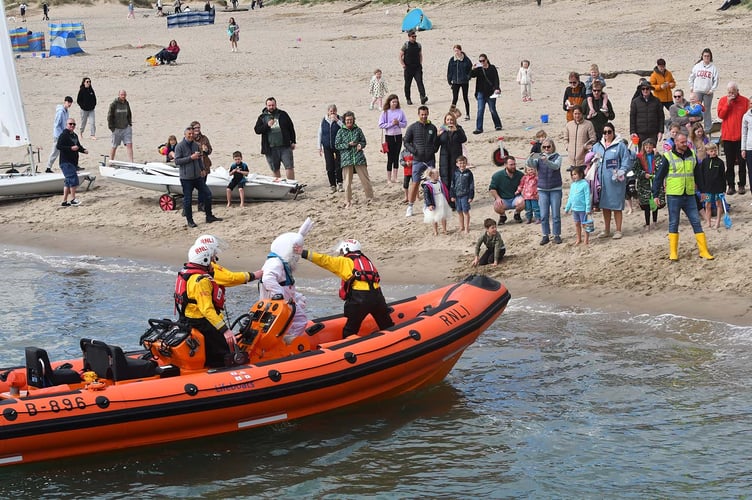 The  Easter Bunny was brought back to Aberdyfi Beach to the relief of everyone watching the dramatic 'rescue'. Photo: Doris O'Keefe