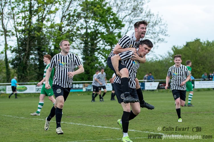 Celebrations after Callum Page scored Bow Street's second goal against Brickfield (Photo: Colin Ewart)