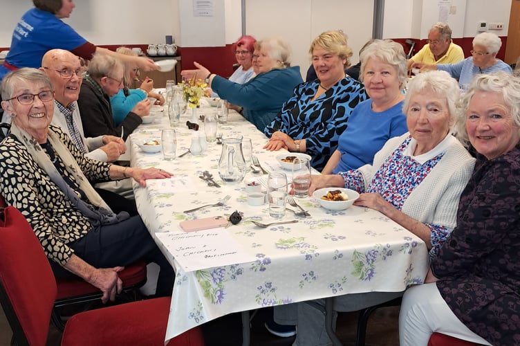 Some of the members of the Tywyn South Meirionnydd Older People Forum enjoying lunch