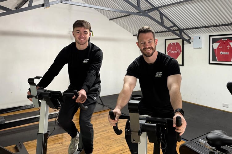 Josh (left) and founder of SE Fitness, Siôn Evans (right) ready to take on month-ling cycling challenge.