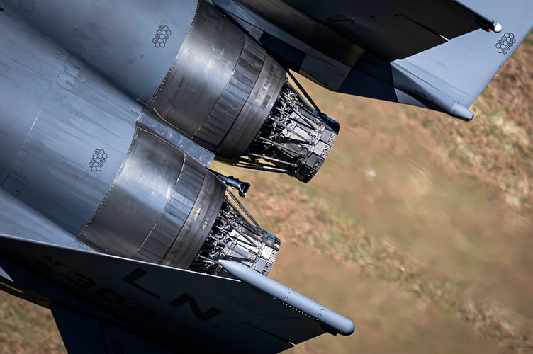 Close-range image of F-15 Eagle fighter jet engines.      Stunning images shows a U.S. warplane zooming over Wales. Photographer David Robertshaw also shot a British Typhoon as it roared through Snowdonia last week. He says: "While camping near Dolgellau last week, I witnessed and photographed a breathtaking display of fast jet activity in one of the UKâs most iconic flight training areas. Against the rugged backdrop of Snowdonia, I captured rare close-range images of both the Eurofighter Typhoon and F-15 Eagle, two of the worldâs most powerful aircraft."