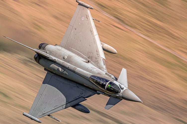 British Eurofighter Typhoon fighter jet. Stunning images shows a U.S. warplane zooming over Wales. Photographer David Robertshaw also shot a British Typhoon as it roared through Snowdonia last week. He says: "While camping near Dolgellau last week, I witnessed and photographed a breathtaking display of fast jet activity in one of the UKâs most iconic flight training areas. Against the rugged backdrop of Snowdonia, I captured rare close-range images of both the Eurofighter Typhoon and F-15 Eagle, two of the worldâs most powerful aircraft."