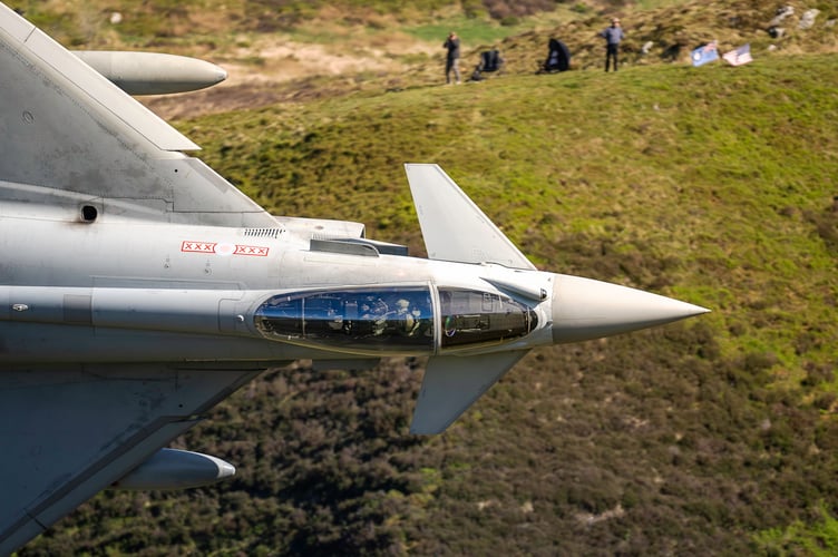 British Eurofighter Typhoon fighter jet.      Stunning images shows a U.S. warplane zooming over Wales. Photographer David Robertshaw also shot a British Typhoon as it roared through Snowdonia last week. He says: "While camping near Dolgellau last week, I witnessed and photographed a breathtaking display of fast jet activity in one of the UKâs most iconic flight training areas. Against the rugged backdrop of Snowdonia, I captured rare close-range images of both the Eurofighter Typhoon and F-15 Eagle, two of the worldâs most powerful aircraft."