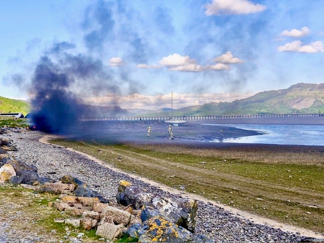 Barmouth RNLI image of the boat on fire