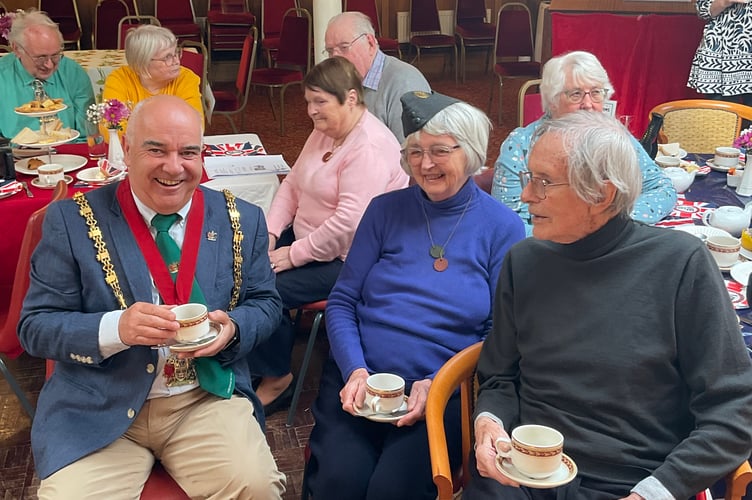 Aberystwyth Mayor, Cllr Maldwyn Pryse, with Caffi Cofion members Richard Hinchcliffe and Ann Walker