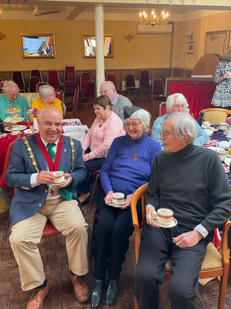 Aberystwyth Mayor, Cllr Maldwyn Pryse, with Caffi Cofion members Richard Hinchcliffe and Ann Walker