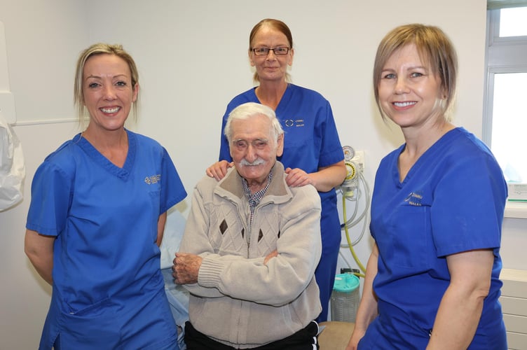Bob (centre) with nurses Carys, Catrin and Ann who work for the Vascular Nurses Outreach Service at Ysbyty Gwynedd