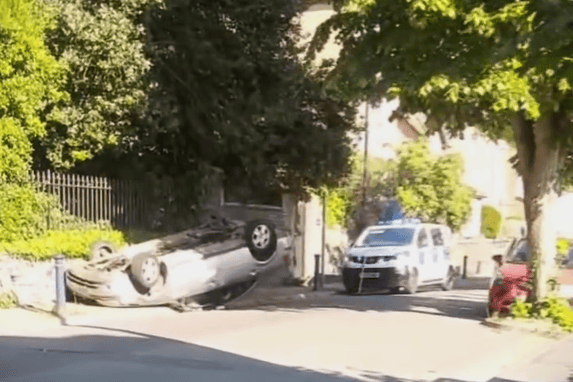 A car was flipped after a collision on North Road in Aberystwyth on Friday 9 May