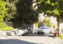 Car flipped upside down in two-vehicle collision in central Aberystwyth