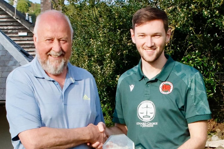 Carno manager Callum Breese is presented with the MMP  Central Wales League North manager of the month award for April