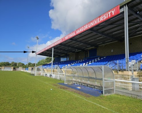 Existing floodlight columns which are to be retained whilst the light fittings are to be changed to the new LED flood lights