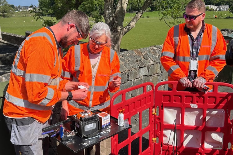 Liz Saville Roberts MP with Openreach engineers in Fairbourne