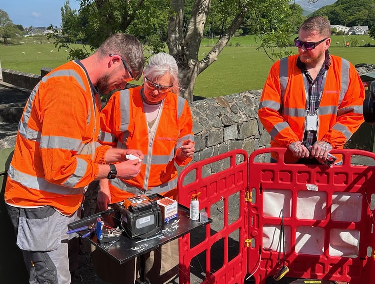 Liz Saville Roberts MP with Openreach engineers in Fairbourne