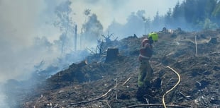 Glaspwll fire “breaches fire breaks” as six more crews called in