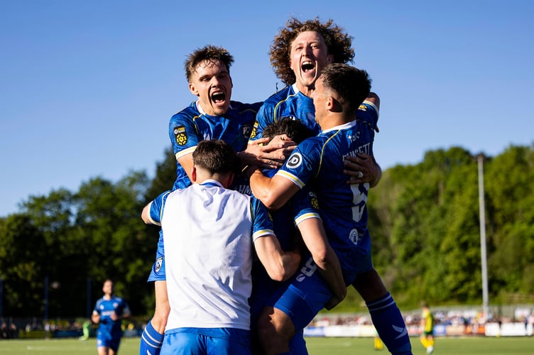 HAVERFORDWEST, WALES - 18 MAY 2025: Haverfordwest County's Ben Ahmun celebrates scoring his sides third goal during the JD Cymru Premier 24/25 - European Play Off match between Haverfordwest County AFC and Caernarfon Town at Ogi Bridge Meadow Stadium in Haverfordwest on the 18th May 2025. (Pic by Lewis Mitchell/FAW)