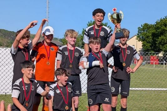 The Magpies celebrate their success at the Penrhyncoch Tournament