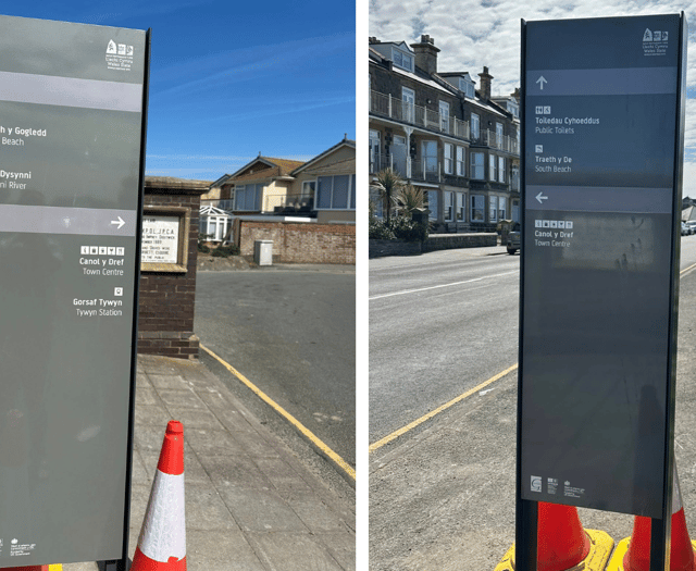 Tywyn promenade signs criticised as 'waste of funds'