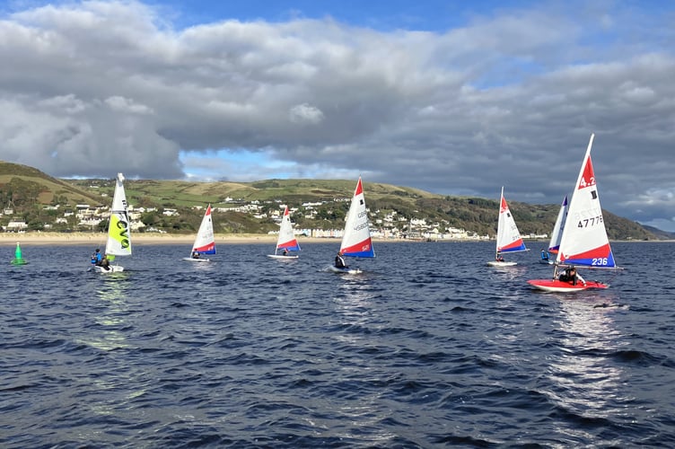 Junior sailors on the water with Dovey YC
