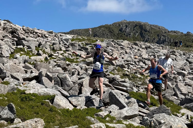 Owain Rowlands descending the mountains