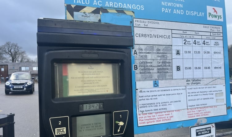 A councillor has called for an update on Powys car parking charges plan
