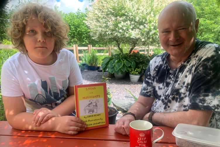 Idris, 10, with Chris Dendy, author of 'Living with Mugwumps' released last winter in aid of Cats Protection