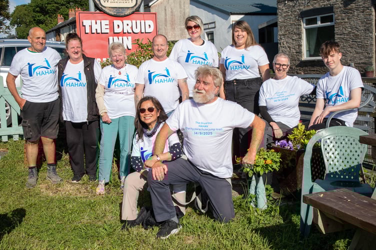 Ten of the thirteen brave souls getting ready to jump out of a plane to raise money for HAHAV