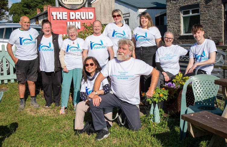 Ten of the thirteen brave souls getting ready to jump out of a plane to raise money for HAHAV