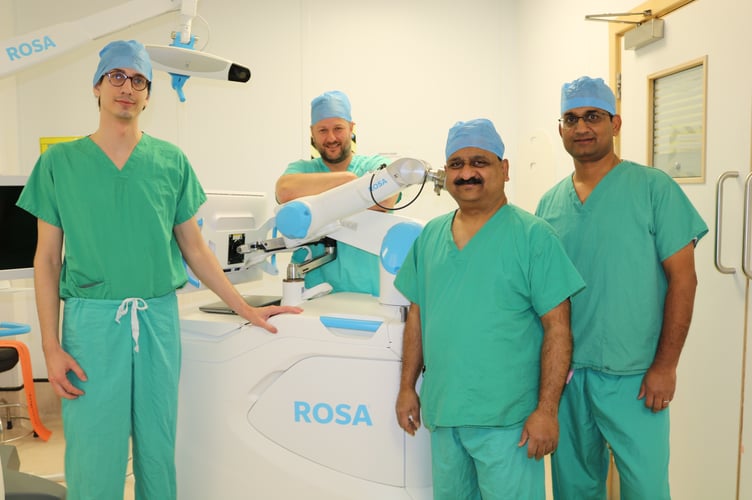 Ashok Singh, Muthu Ganapathi and surgeons from Slovakia (centre Dr Jozef Almási) during a recent visit to Ysbyty Gwynedd. Photo: Ysbyty Gwynedd