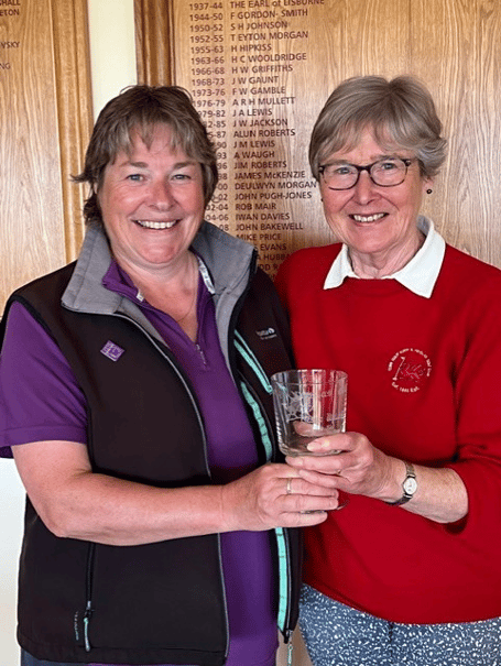 Captain Helen hands the Wilding Goblet to Jean Harrison
