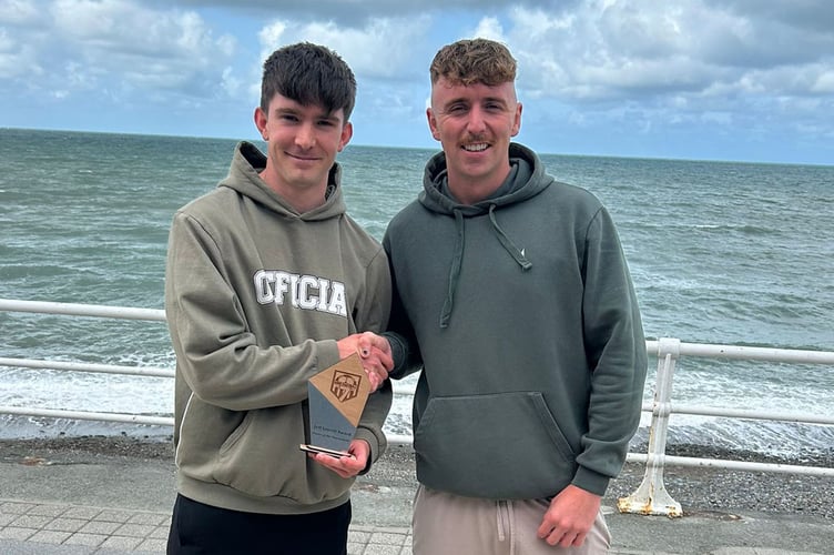 Steffan presents the Jeff Saycell award to Jamie Jones