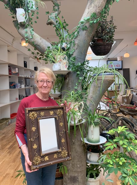 Janet helping to stock the new Climate Shop in Aberystwyth