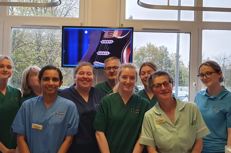 Staff from Teifi Ward with one of the TVs