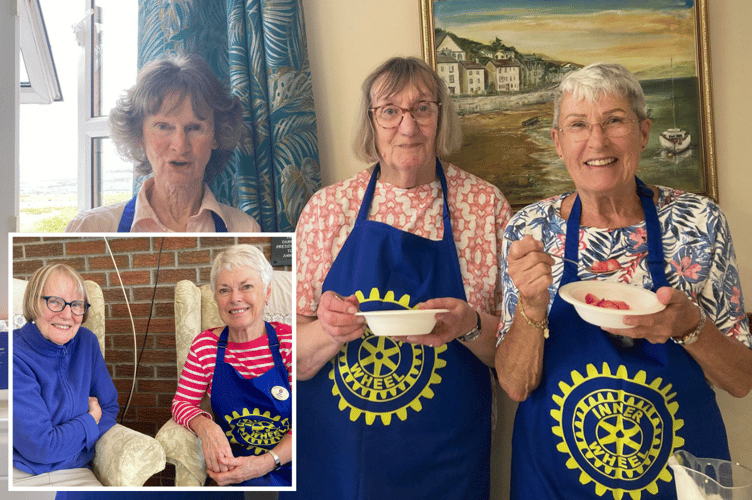 (Main) The Tywyn Inner Wheel ladies are ready for action and (inset) a surprise visitor at the tea, Tywyn's founder Inner Wheel Secretary, June Davies, on holiday from Australia where she has lived for over 20 years. She is pictured with the current secretary, Mair Worsey.