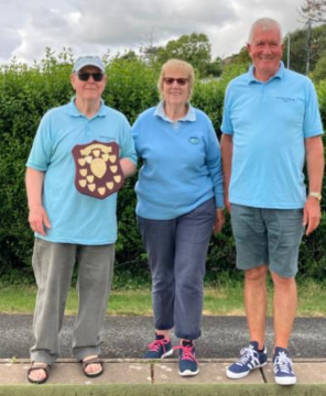 Winner, Colin, and runner up Andy having are congratulated by Mari O’Rourke (treasurer) in the absence of chairperson Pam Payton