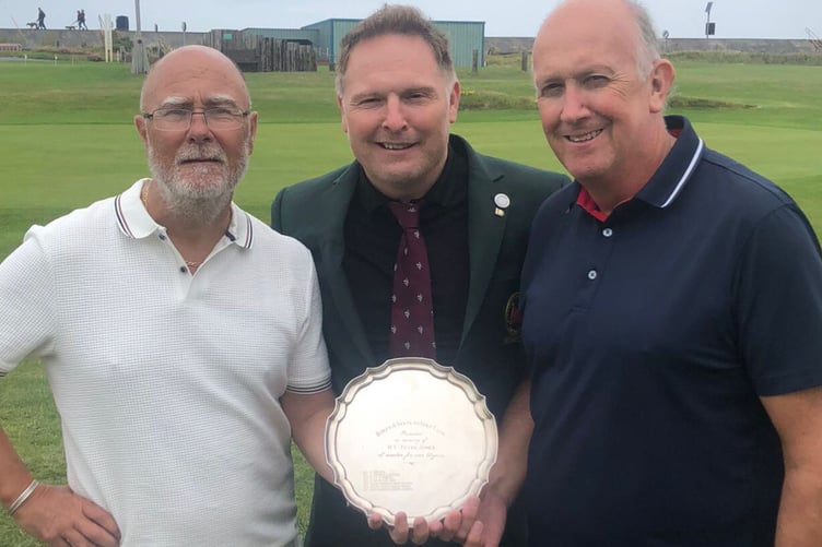 Captain Nick Downing presenting the Peter Jones Salver to Roy Jones and Geraint Evans